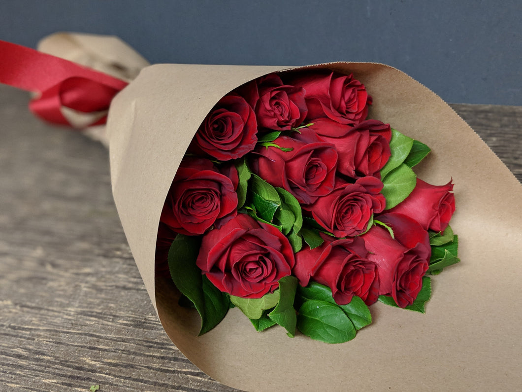 Dozen Roses Wrapped In Paper